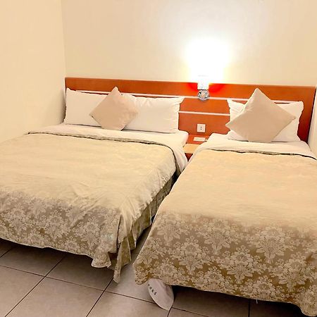 Hua Guo Hotel كيلونغ الغرفة الصورة
