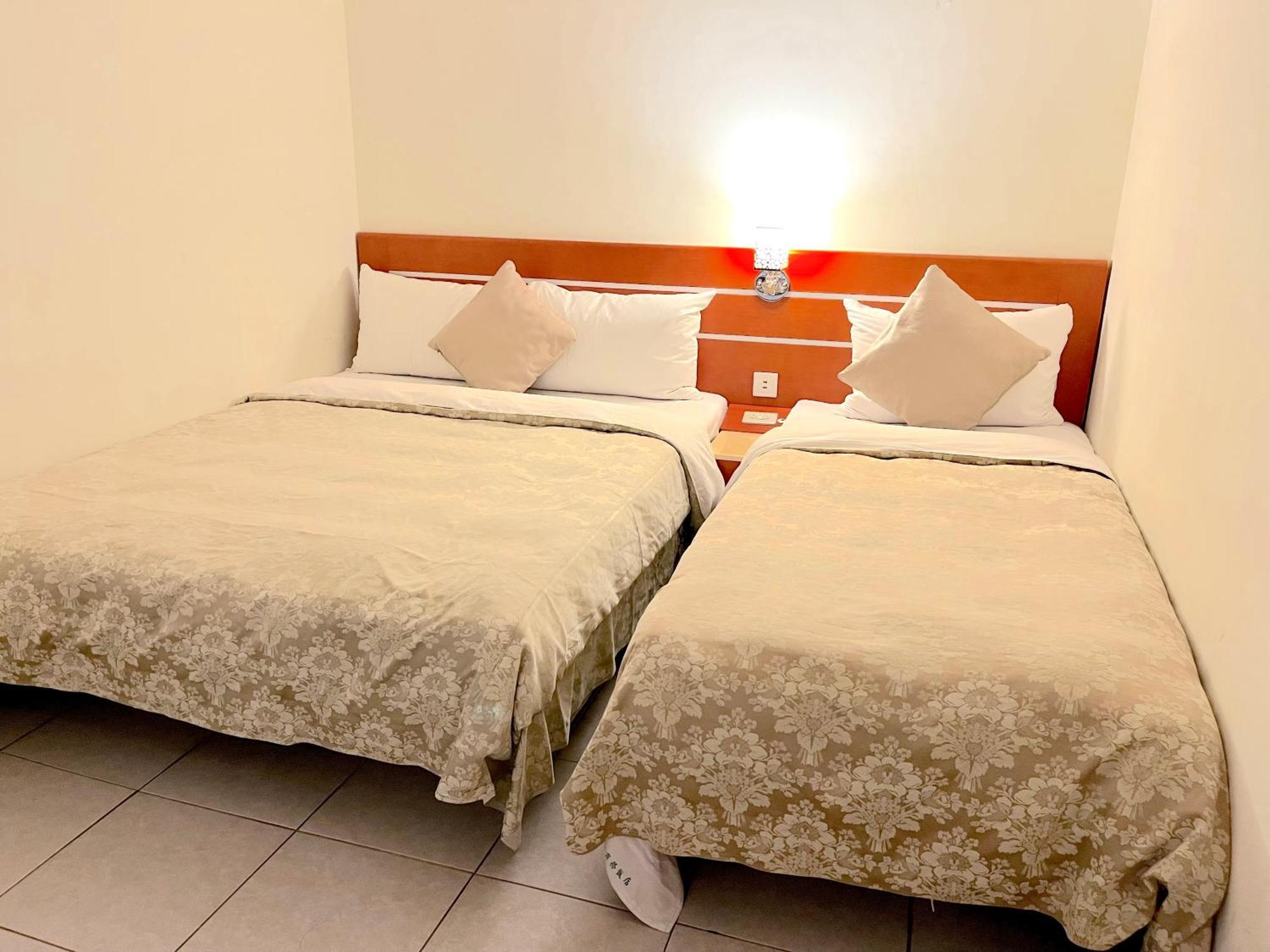Hua Guo Hotel كيلونغ الغرفة الصورة
